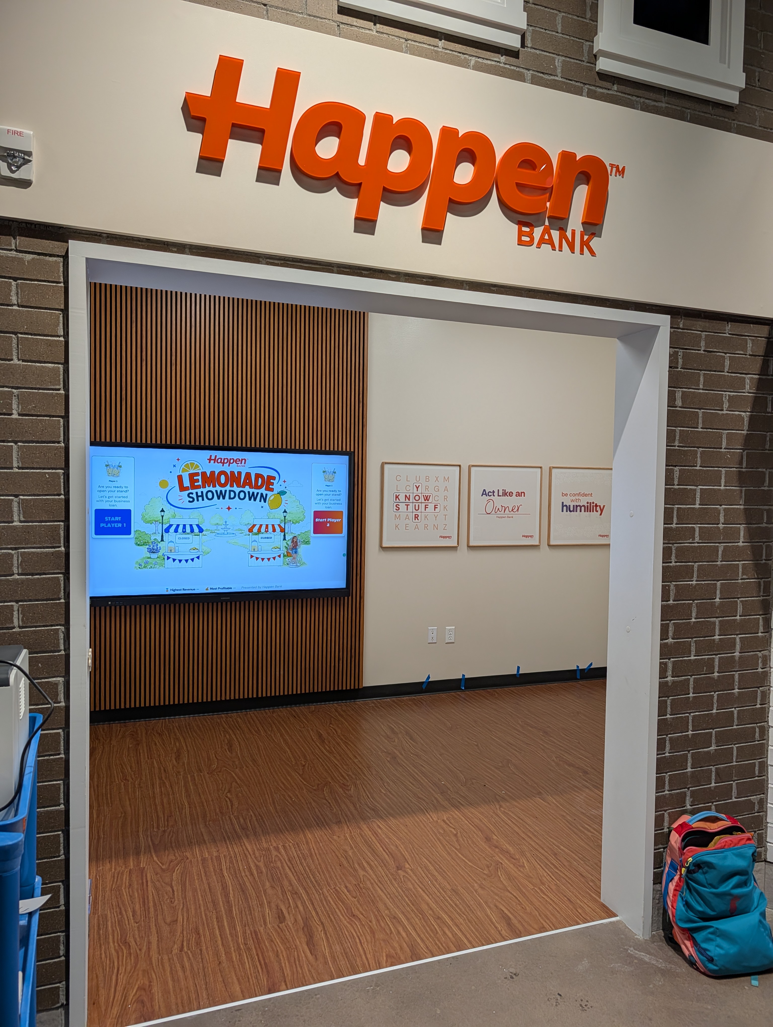 Lemonade Showdown running inside the Happen Bank storefront